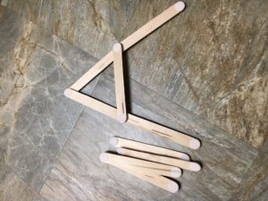 Build-a-Letter- -Popsicle sticks with Velcro dots on each end and on both sides; create a guide by taking photos of each letter and number made with the sticks.