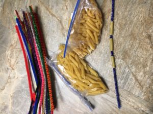 Pipe Cleaners and Pasta- -You can’t get much simpler than this! Bag up a few different dry pasta shapes and a bundle of pipe cleaners. Let the child practice stringing pasta either to make jewelry or just for fun.